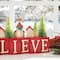 Glitzhome® 14" Christmas Believe House & Brush Trees Table Décor